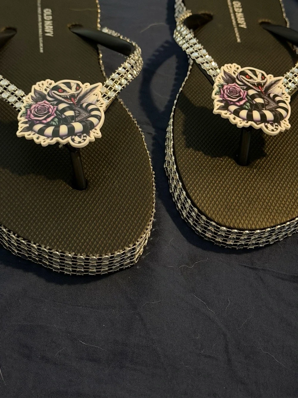 Black Rhinestone-Trim Flip Flops with Snake & Rose Accent
